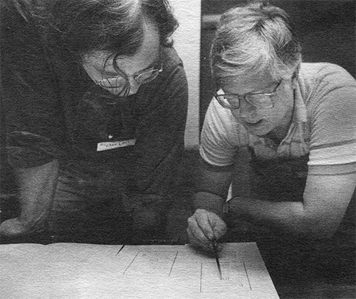 Dan Carr and Stan Nelson critique a specimen
